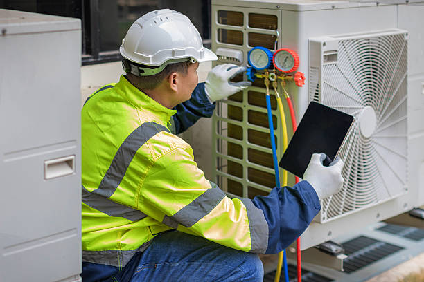 Professional Ductwork Repair technician working in Lowell, MA